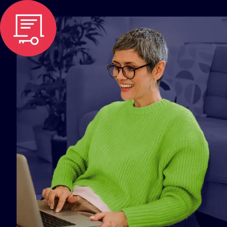 Person using laptop with icon representing access management