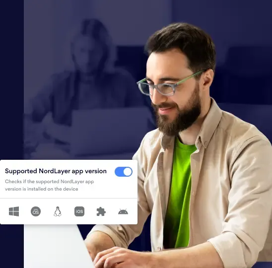 Man with the laptop configuring NordLayer app version verification policy settings