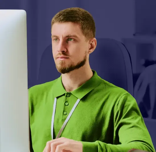 Professional man in green polo shirt with security badge