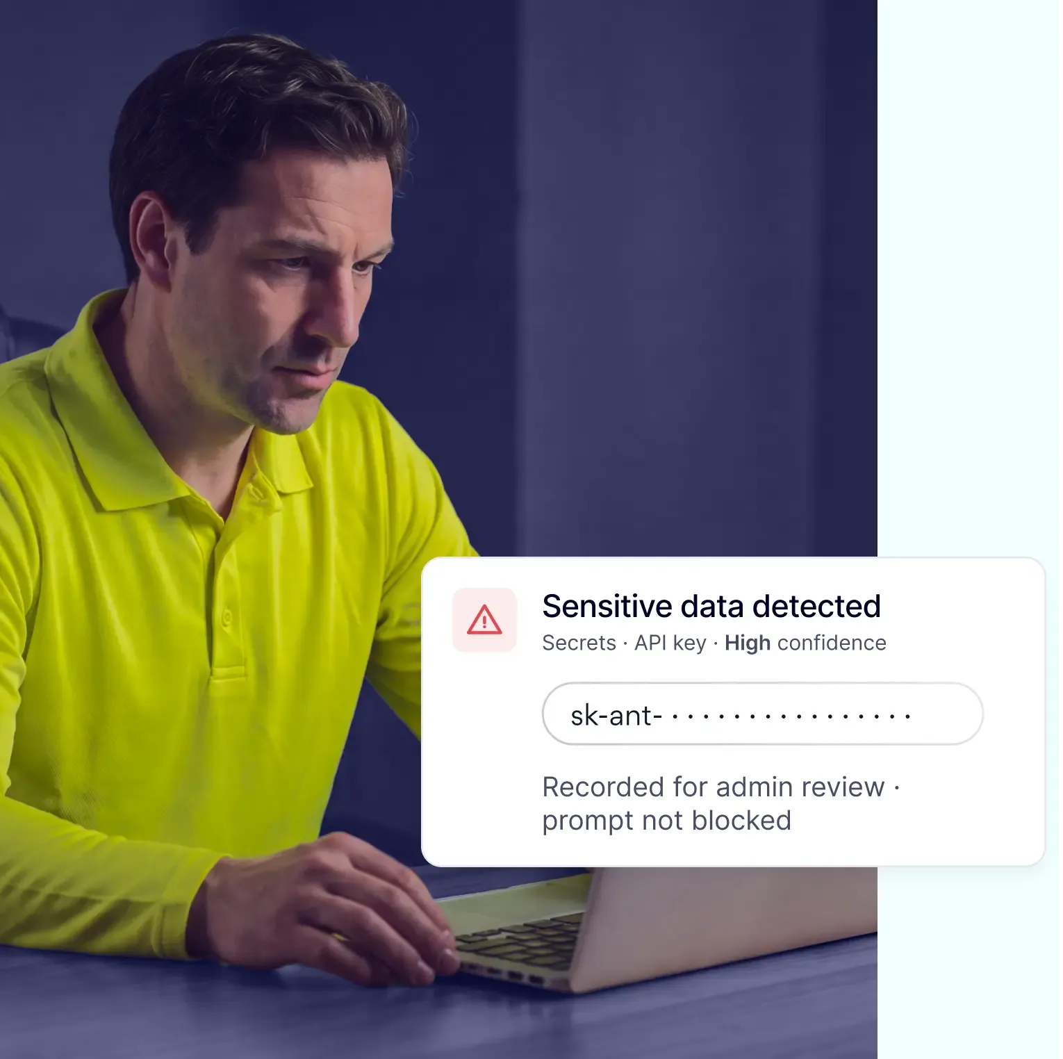Professional reviewing API key detection alert in security dashboard